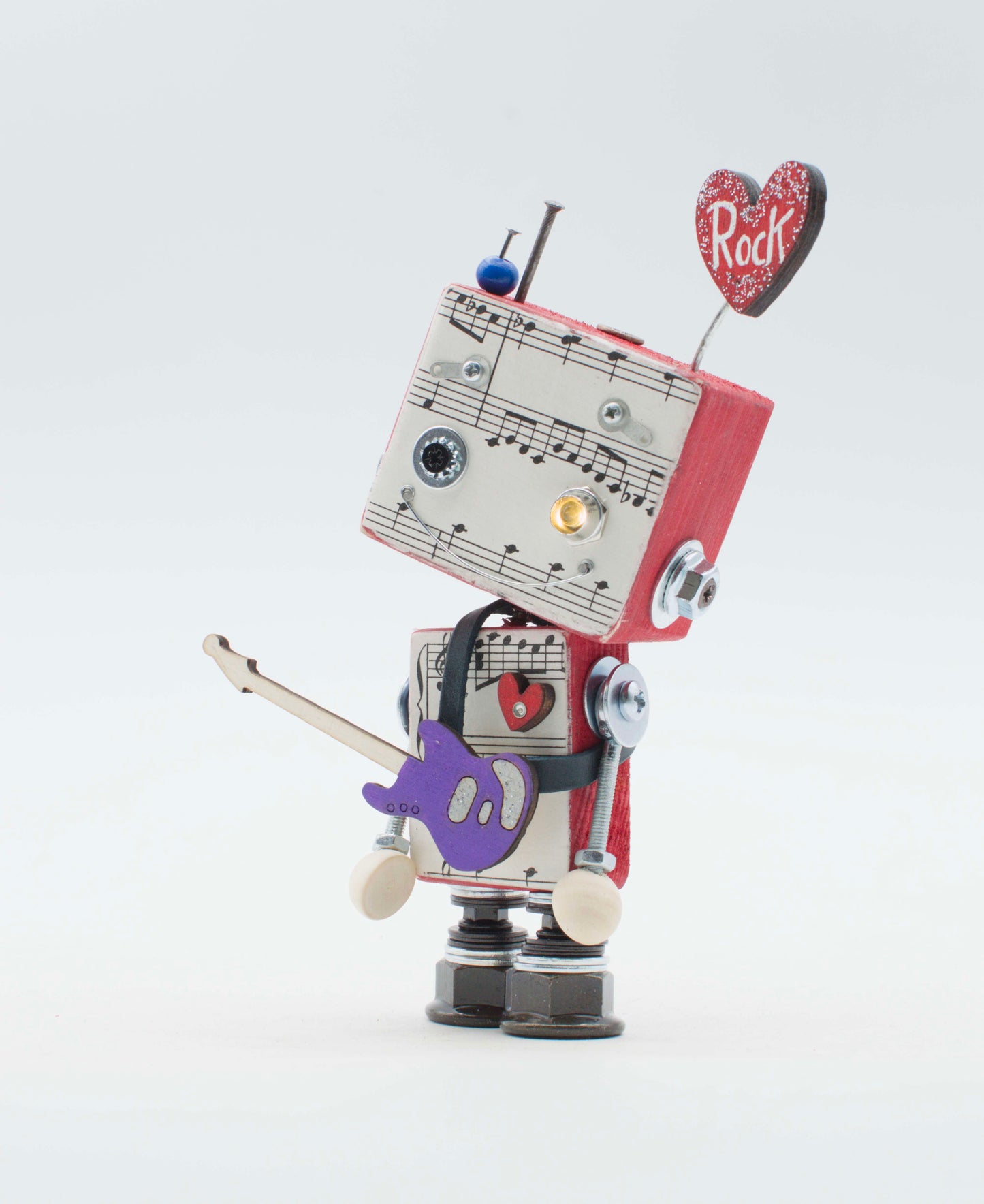 Lampada di legno robot musica rossa e argento con volto spartito musicale che tiene chitarra viola