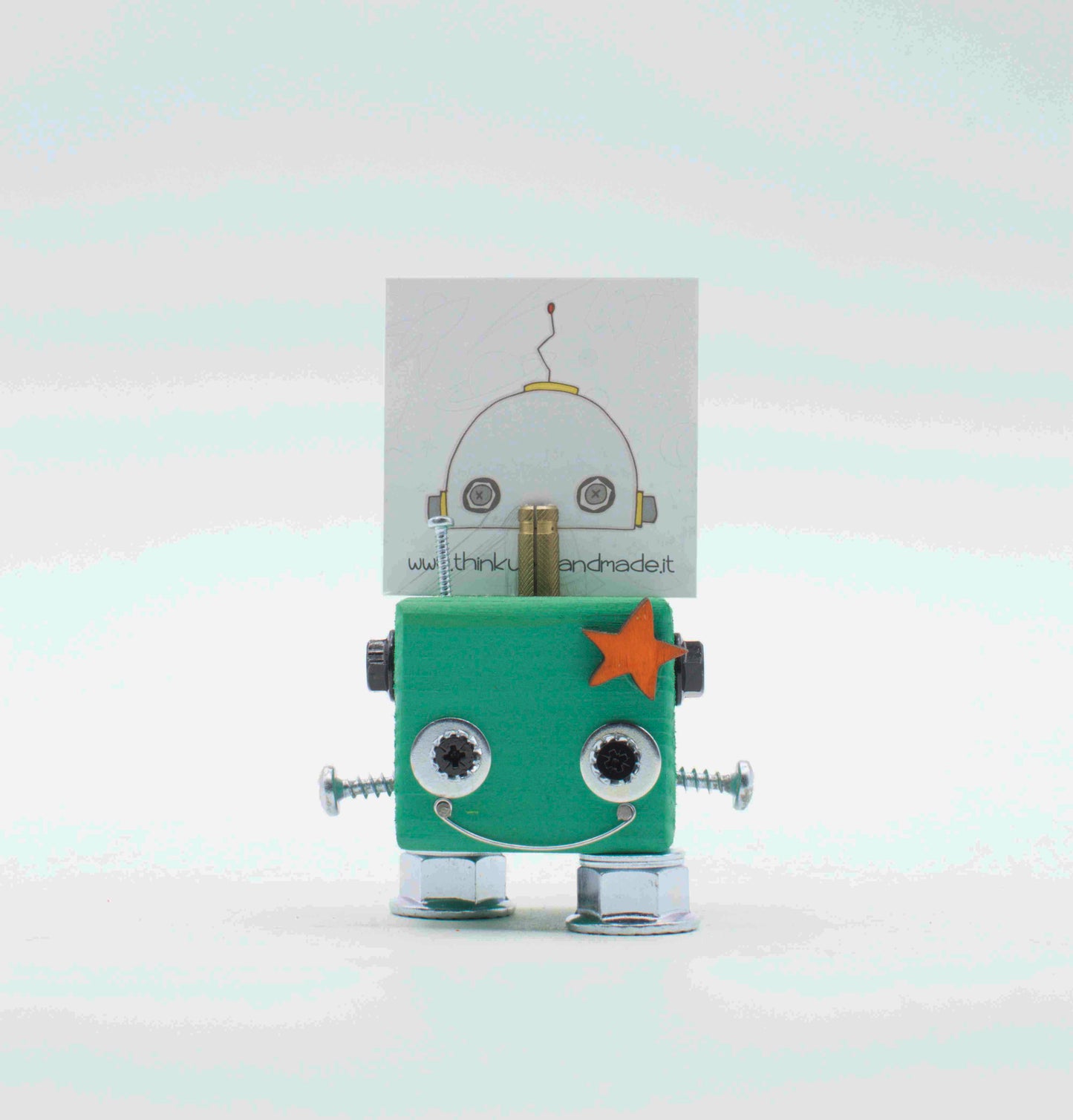 Portafoto da tavolo robot in verde menta con occhi a vite argento, stella decorativa e piedi trasparenti in plastica