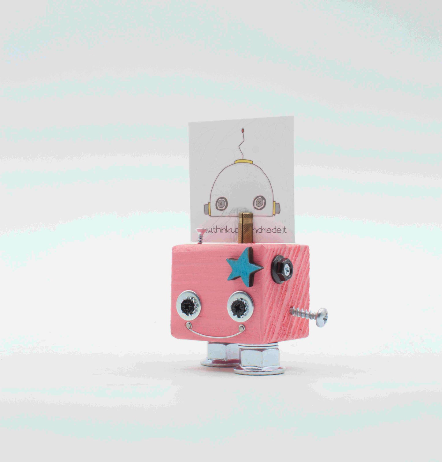 Portafoto da tavolo robot in legno rosa con occhi metallici argento stella blu e dettagli a bulloni in metallo