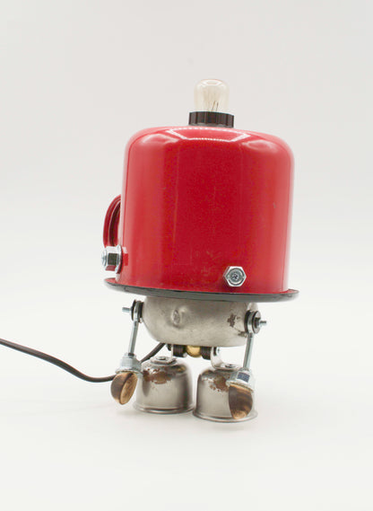 Lampada da tavolo robot in smalto rosso con gambe metalliche e lampadina trasparente modello pentolino fatta a mano