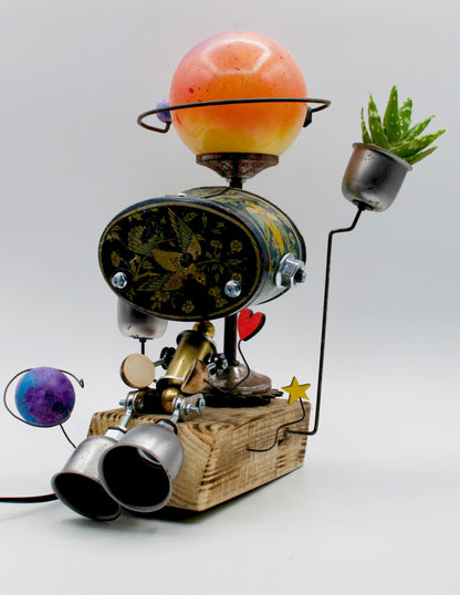 Graziosa lampada creata a mano stile romantico con testa sferica arancione e corpo in ottone nero per tavolo
